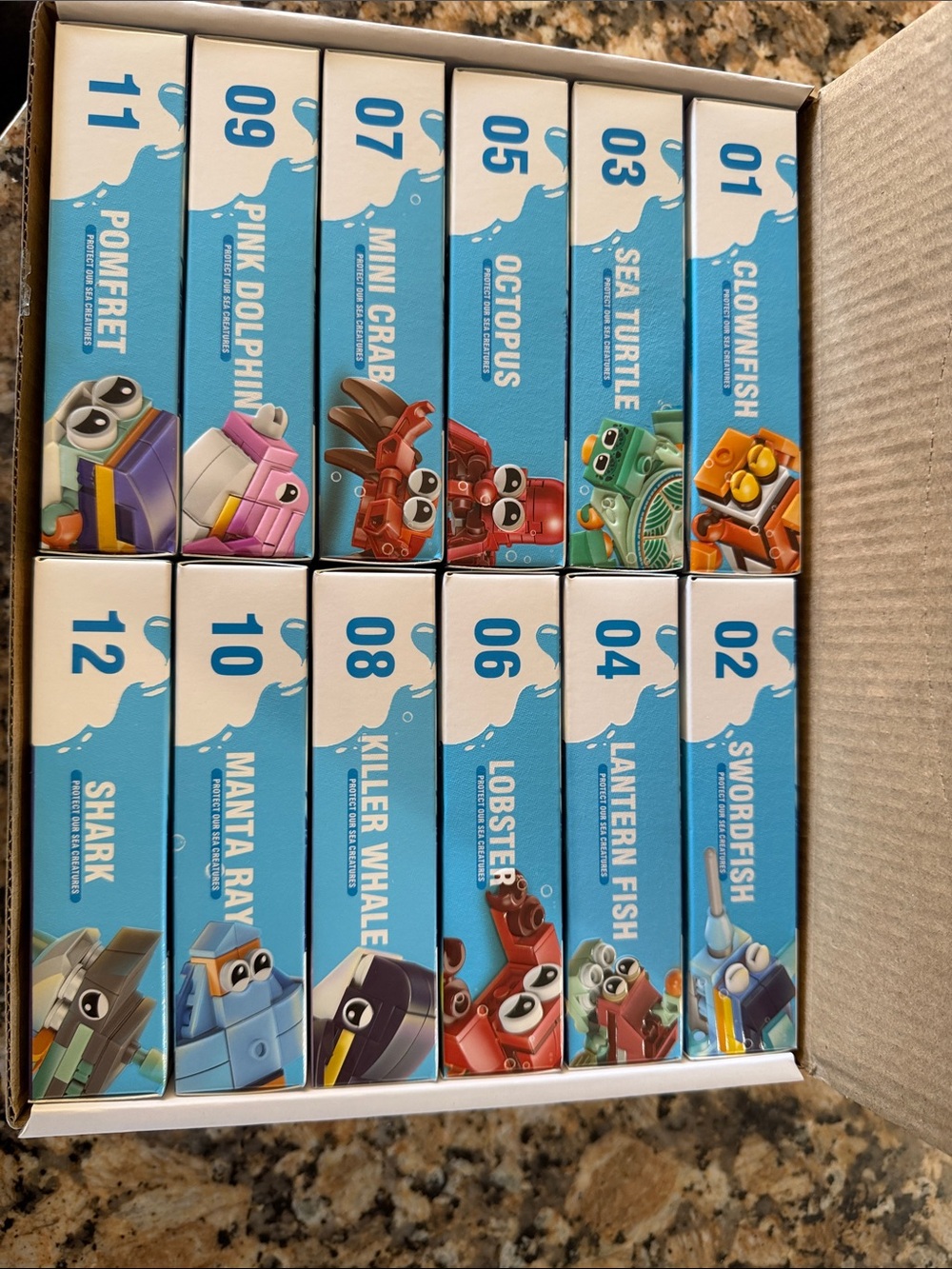 New 12 Boxes of Marine Organism Building Block Toy Sets in Display Case